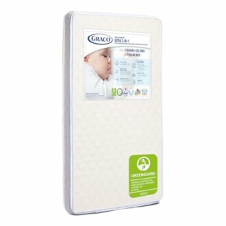 Graco Ultra 2-in-1 crib mattress with GREENGUARD certification label.