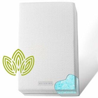 Infant mattress with gel layer and green leaf design.