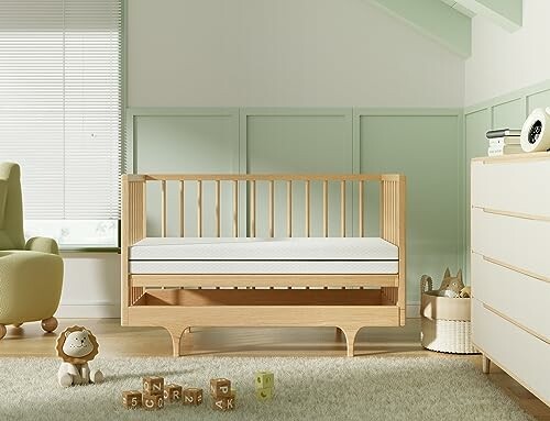Modern nursery with wooden crib and toys